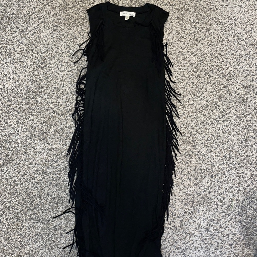Black ribbed dress with tassels along the sides